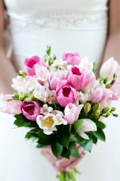 
                    
                        A bouquet of pink and white tulips is beautiful, sophisticated and elegant all at the same time.
                    
                
