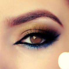 Rustic Morocco using gold and bronzes with blue eyeshadow underneath eye makeup