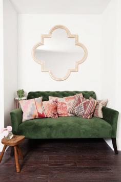 Elton Settee from west elm (love these colors and patterns on a green couch)