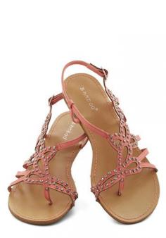 That Girly Glimmer Sandal in Pink. In your opinion, every last look needs a feminine touch, such as these pink sandals! #pink #modcloth