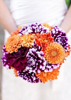 
                    
                        With multi-layered petals and full blooms the size of a dinner plate, it’s easy to see why dahlias make for one spectacular summer flower. #weddingbouquet
                    
                