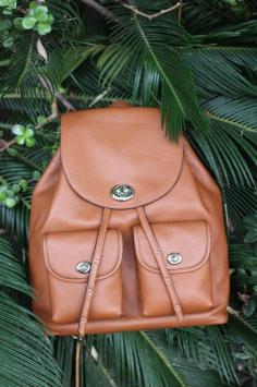 
                    
                        Loving the tiny turnlocks on this timeless Coach saddle brown backpack. #Ad
                    
                