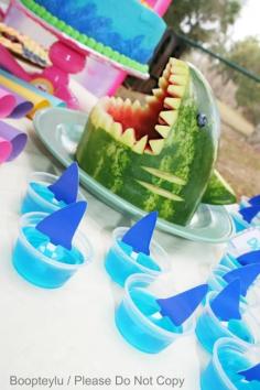 
                    
                        Shark Week Party! Play shark week on a projector outside by the pool, carve the watermelon into a shark, and have shark-themed jello-shots! (or just jello for a kids party)
                    
                