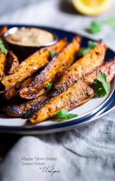 
                    
                        Maple Tahini Grilled Sweet Potatoes - Grilled sweet potatoes are dipped into a creamy, sweet dip of maple syrup and tahini for an easy, paleo and vegan friendly side dish. A perfect, healthy summer side dish! | FoodFaithfitness.com | Taylor | Food Faith Fitness
                    
                