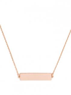 
                    
                        A slim metallic bar pendant lends clean, architectural lines to a layered necklace look.
                    
                