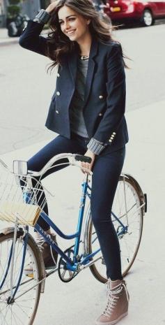 Military style jacket, skinny jeans, brown sneaker wedges. #bicycle
