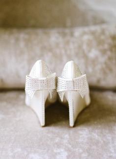 Wonderful white bow sparkling shoes with a twist. Photography by www.laurenfairphotography.com