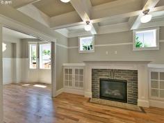 Fireplace, bookshelves and high windows. I love it!!!!