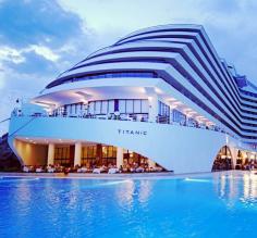 
                    
                        Situated in the resort town of Antalya on Turkey’s Turquoise Coast, this all-inclusive resort wanted to emulate the “unsinkable” ocean liner that was the apex of class in its day. Tarik Egeman, the marketing manager of the hotel explains, “We were inspired by the legendary cruise ship Titanic. It was the most elegant, luxurious, and comfortable cruise ship of its era.”
                    
                