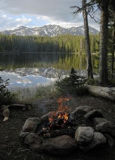 lakeside campfire mountain view