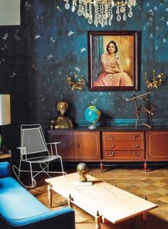 blue wallpaper, blue sofa, wood credenza, checkerboard floor, crystal chandelier // living room, Mexican Home | Apartment Therapy