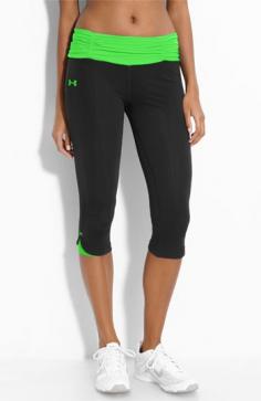 Under Armour yoga pants- (M-L) (Mc sports back towards the dressing rooms) Price=? Color-?