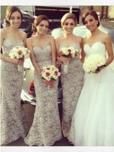 3 bridesmaids with their dresses and beautiful bride.