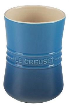 Keep the utensils and kitchen tools you use most frequently at your fingertips while adding a touch of colorful fun to your counter with this Le Creuset 2.75-qt. Enamel Utensil Crock. Designed to complement your existing Le Creuset cookware and serving containers, this crock is substantially sized for holding spatulas, tongs, whisks and turners within easy reach of your stovetop or prep area, so you can grab the tool you need quickly and easily whether you're stirring up cookie dough or flipping flapjacks on the griddle. It's made from premium stoneware that resists stains and won't absorb flavors or odors, making it a durable must have for your busy kitchen. This crock won't crack, craze or ripple because the stoneware used is less than 1 percent porous - a feature that blocks the absorption of moisture so that your crock looks great, inside and out, even after long-term use. Its enameled exterior lends it protection from scratches and metal marks for extended service life and resilience. Best Used For: Use this Le Creuset 2.75-qt. Enamel Utensil Crock to organize the most-needed utensils in your kitchen or display some fresh-cut flowers from the garden on your kitchen table. It's also ideal for serving breadsticks at your next Italian-inspired feast. Features: Dishwasher safe for convenient cleanup Limited 5-year warranty ensures satisfaction Le Creuset signature on front for added beauty on your counter Coordinates with cookware, dinnerware and serving dishes from Le Creuset