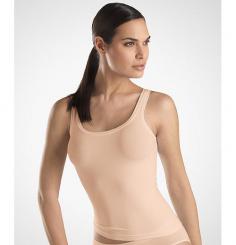 Hanro Touch Feeling Tank Top (1814). This tank top is seamless for a comfortable fit. Features breathable, soft fabric. Made at Hanro's European mills, Hanro lingerie items are investment pieces that will last for years to come. Scoop neck is flattering. Covered elastic along neckline and arm openings for custom fit. Seamless sides and back for a smooth look. Classic style may be worn alone or layered. See matching Hanro Touch Feeling Hi-Cut Brief Panties 1812. Made in Portugal. Please Note: Deep Violet is a fashion color with limited availability.