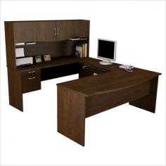 Dimensions: 88.625L x 71.125W x 61.875H inches. U-shaped workstation with storage drawers. Engineered wood construction with melamine top. 2 cabinets, 2 drawers, pull-out keyboard shelf. Available in Bordeaux or Chocolate finishes. 10 year warranty. Surround yourself with a perfectly utilitarian workspace thanks to the Bestar Harmony U-Shaped Workstation. This handsome desk set has seemingly endless space including a typing shelf that glides out on smooth ball bearings. The keyboard shelf can be installed under the credenza or bridge. The kit is reversible so you can set it up to fit your own office orientation. One utility drawer sits above a deep file drawer with letter/legal filing system and they both lock with a single key. Cabinets keep you organized and a rubber strip manages wiring. Hanging document shelves keep current projects at hand but out of the way. The smooth surface is a sturdy one-inch thick for strength with a hard commercial-grade melamine veneer that resists scratches and stains and cleans up with an easy wipe. Choose medium brown Bordeaux or dark Chocolate wood finishes. Meets or exceeds AINSI/BIFMA standards. Assembles easily. Work in the lap of luxury! About BestarEstablished in 1948 and based in Canada Bestar is a third-generation family business involved in the design manufacturing and distribution of a wide range of ready-to-assemble furniture and furniture components. Bestar's mission is to create produce and distribute mid- to high-end ready-to-assemble furniture for home offices small commercial offices and home entertainment. Bestar offers a combination of price quality and service that exceeds the expectations of customers and consumers. Color: Chocolate.