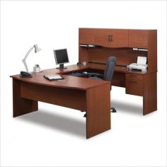 Dimensions: 88.625L x 71.125W x 61.875H inches. U-shaped workstation with storage drawers. Engineered wood construction with melamine top. 2 cabinets, 2 drawers, pull-out keyboard shelf. Available in Bordeaux or Chocolate finishes. 10 year warranty. Surround yourself with a perfectly utilitarian workspace thanks to the Bestar Harmony U-Shaped Workstation. This handsome desk set has seemingly endless space including a typing shelf that glides out on smooth ball bearings. The keyboard shelf can be installed under the credenza or bridge. The kit is reversible so you can set it up to fit your own office orientation. One utility drawer sits above a deep file drawer with letter/legal filing system and they both lock with a single key. Cabinets keep you organized and a rubber strip manages wiring. Hanging document shelves keep current projects at hand but out of the way. The smooth surface is a sturdy one-inch thick for strength with a hard commercial-grade melamine veneer that resists scratches and stains and cleans up with an easy wipe. Choose medium brown Bordeaux or dark Chocolate wood finishes. Meets or exceeds AINSI/BIFMA standards. Assembles easily. Work in the lap of luxury! About BestarEstablished in 1948 and based in Canada Bestar is a third-generation family business involved in the design manufacturing and distribution of a wide range of ready-to-assemble furniture and furniture components. Bestar's mission is to create produce and distribute mid- to high-end ready-to-assemble furniture for home offices small commercial offices and home entertainment. Bestar offers a combination of price quality and service that exceeds the expectations of customers and consumers. Color: Bordeaux & Charcoal.