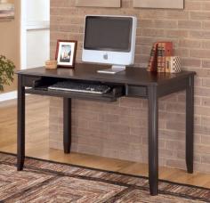 Dimensions: 47.75W x 28.13D x 30.06H in. Modern design featuring small tapered legs. Made from select veneers and hardwood solids. Black finish and satin nickel colored hardware. Pull-out keyboard tray. The Signature Design By Ashley Carlyle Small Leg Desk is a slender, contemporary design that brings a sophisticated touch to your home office. This desk features an expansive work top, pull-out keyboard tray, and top-quality construction with select veneers and hardwood solids in a sleek black finish that looks great in any decor. About Signature Design By AshleySignature Design By Ashley, Inc. is the largest manufacturer of furniture in the world. Established in 1945, Ashley offers one of the industry's broadest product assortments to retail partners in 123 countries. From design, through fulfillment, Ashley continuously strives to provide you, our customer, with the best values, selection and service in the furniture industry.