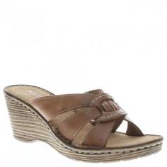 Show off some curves with the intricate design of this multi-strap platform sandal with a circular woven pattern High-quality leather upper Comfort padded footbed with a leather insole featuring a side-stitch construction3" heel height Please order Euro sizing:35 (Fits Women's shoe size 5)36 (Fits Women's shoe sizes 5-1/2 to 6)37 (Fits Women's shoe sizes 6-1/2 to 7)38 (Fits Women's shoe sizes 7-1/2 to 8)39 (Fits Women's shoe size 8-1/2)40 (Fits Women's shoe size 9)41 (Fits Women's shoe sizes 9-1/2
