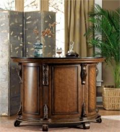 Bourbon Street Yorktown Cherry Traditional Bar with Black Granite Top by Powell 579-920. Powell Cherry Traditional Bar with Black Granite Top is the fine examples of Edwardian architectural elements adorn this distinctive demilune bar. Features include a solid black granite top great for serving and easy to clear, 3 wine racks designed to hold up to 15 bottles, 4 rows of stemware holders can hold up to 12 wine glasses depending on the diameter, 2 generous storage drawers, and 2 storage cabinets with adjustable shelves inside. Solid Black Granite Top. 3 Wine Racks. 4 Rows of Stemware Holders. 2 Generous Storage Drawers, and 2 Storage Cabinets. Assembly Required. Specifications Product Type Home Bar Collection Name Bourbon Street Brand Powell Frame Material Wood Finish Yorktown Cherry Dimensions Width 24.2 in. Depth 58.9 in. Height 42.5 in. Dimensions 24.2" W x 58.9" D x 42.5" H Weight 319 lbs. Please refer to the Specifications to determine what items are included since sometimes the image shows more or less items. If you are not sure, please contact us and our customer service will be glad to help.