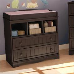 Savannah Changing Table - Espresso by South Shore 3519330. The Savannah collection offers you this country-style changing table. It features rounded safety rails for your baby's safety and comfort. Two practical drawers and three open storage compartments keep everything you need to care for your little one within easy reach. Interior drawer dimensions: 13-1/2-inch wide by 14-1/4-inch front to back. This product is manufactured in compliance with consumer health and safety laws and ASTM standard F2057. It is made of recycled CARB compliant particle panels. The glides are made of polymer and include dampers and catches, creating a secure environment for little ones. It has to be assembled by two adults. Measures 35-inch wide by 20-inch deep by 37-inch high. It is delivered in one box measuring 38-inch by 20-inch by 7-inch and weighs 82-pounds. This product has been designed to match most espresso-finish cribs on the market today. Also available in a Pure White finish. Tools are not included. 5 year warranty. Made in Canada. Specification This item includes: SS-3519330 Savannah Collection Changing Table - Espresso - South Shore 35L x 20D x 37H Please refer to the Specifications to determine what items are included since sometimes the image shows more or less items. If you are not sure, please contact us and our customer service will be glad to help.
