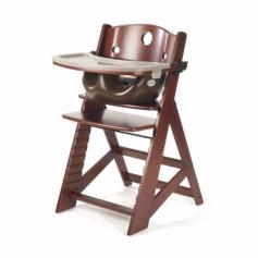 Quality wood construction in mahogany finish Ergonomic design tip resistant Adjustable chair seats from 6 months up to 250 lbs.3-point safety belt keeps your child safe Dimensions: 17.75W x 21.5D x 33.5H inches. You and your baby will love the Keekaroo Height Right High Chair Mahogany with Chocolate Infant Insert and Tray. This versatile chair provides the safety and comfort you're looking for yet adapts as your child grows. Made from environmentally friendly Rubberwood its sturdy design holds up to 250 pounds and will be your child's favorite seat for years to come The included BPA- and latex-free Infant Insert and 3-point harness ensures a perfect safe seat for your child under 3 years old. When mealtime is over simply wipe the chair and insert down with warm soapy water. The insert's outer layer is impermeable to liquids and offers antimicrobial protection. The plastic tray cover is BPA-free and dishwasher safe. Five year manufacturer's warranty. Assembly required. The Beauty and Benefits of RubberwoodHailing from the maple family of trees the rubber tree is used in the manufacture of high-end furniture. This durable Asian hardwood is valued for its dense grain minimal shrinkage attractive color and acceptance of different finishes. It is also prized as an environmentally friendly wood as it makes use of trees that have been cut down at the end of their latex-producing cycle. About KeekarooKeekaroo high chairs and accessories were the brainchild of a father devoted to making better safer furniture for his own children. Rethinking size shape and support from the perspective of a parent owner Tom Bergeron tapped the creativity and insights of his own children to create the most innovative line of high chairs and accessories available. Each offers a more comfortable seating experience grows with your child and has an easy-to-clean surface for Mom and Dad.
