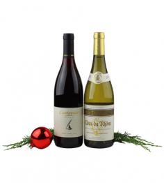 This classic duo of Pinot Noir and Cotes du Rhone will surely please palates and delight epicureans. Bottoms up and bon appétit! Collection includes one bottle of each (2 bottles): San Valencia 2014 Pinot Noir Hauntingly seductive and delicious, this Pinot from Chile can be as lush as a strawberry, as intense as red currant. The wine is more full-bodied than its medium-ruby color suggests, making it an excellent pair for rich dishes-salmon, duck, or black truffle tagliatelle will envelop the fine-grained tannins and acid that promise several years in the bottle. Pinot lovers, rejoice! Tete du Rhone 2013 Cotes du Rhone, France The Rhône Valley, by its very nature has always been the ideal route between the Mediterranean and Northern Europe. Beginning as a trade route for the Ancient Greeks, the Rhône was quickly recognized for its fertile soil and became a location for wine production when the Romans arrived in 125 BC. Selected from key vineyards on both side of the Rhône River, this wine is the result of careful blending by our winemaker to o er a delicate but fruit forward wine. It has a subtle nose with floral aromas and notes of peaches and apricots. Leading to a nice roundness in the mouth, with final notes of honey and lemon. Best paired with shellfish or fresh herb pasta. Our 100% Satisfaction Guarantee. At Winetasting.com, we guarantee every wine we sell. We are not some new emerging dot-com business. We've been operating our company since 1991 - first as the Ambrosia Wine Catalog, and now as Winetasting.com. Located right here in the beautiful Napa Valley, we are surrounded by a plethora of world-famous wineries. Our collection is a reflection of our home, and we want you to be 100% satisfied each and every time you order. If you are not 100% satisfied with any wine you have purchased from us, we will gladly exchange the product or issue you a refund. Simply give us a call at (800) 435-2225, M-F, 8am-5pm "Wine Country Time" (PST). *No further discounts, promotions, clubs or memberships will apply. Items are subject to availability, substitutions of equal quality & value may occur. Expedited shipping extra.