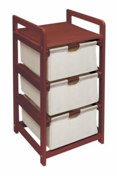 Drawer dimensions: 13.5L x 13.75W x 7H inches. Overall dimensions: 15W x 14D x 29.5H inches. Lightweight 3 canvas drawer storage unit. Wooden construction. Pullout poly-cotton canvas drawers. Wood top shelf, drawers has support panels. Spot clean fabric. The Badger Basket White 3 Drawer Hamper/Storage Unit comes with 3 canvas basket drawers available in 2 wood finishes. Wood frame in your choice of natural or cherry finish with sturdy wood top shelf. Easy pull out drawers quickly load and unload with stoppers on the drawer track. Drawer bottoms have supportive hard panels to prevent sagging. Canvas drawers are 80% cotton 20% polyester and easily spot cleaned. Ideal for laundry/clothes toy hats winter items baby items the uses are endless. Overall dimensions: 15W x 14D x 29.5H inches Drawer dimensions: 12L x 11.5W x 6.5H inches. Some assembly required. Badger Basket CompanyFor over 65 years Badger Basket Company has been a premier manufacturer of baskets bassinets bassinet bedding changing tables doll furniture hampers toy boxes and more for infants babies and children. Badger Basket Company creates beautiful and comfortable products that are continually updated and refreshed bringing you exciting new styles and fashions that complement the nostalgic and traditional products in the Badger Basket line. Keep any room neat and orderly with this storage unit from Badger Basket Company. It has a sturdy wood frame available in a natural or cherry finish to suit your decor. Its three lightweight drawers are constructed of durable poly-cotton canvas and have support panels for extra strength. The drawers are completely removable, and the top shelf is made of solid wood for storing heavier items. The unit has enough storage space to hold baby necessities, toys, clothing, and more. Color: Red.