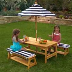 Our Outdoor Table and Bench Set with Cushions & Umbrella is perfect for eating meals, playing games, working on homework and more. This outdoor furniture set is perfect for the summer months and will look great on any patio. 00106 Features: Matching canopy and bench cushions Convenient storage below each bench Tall umbrella helps shield children from UV lights Made of weather-resistant wood Makes a great gift idea for families with multiple children Smart, sturdy construction Good for children 5+ years old Materials: Sanmu wood Dimensions: Table 42"L x 22.64"W x 18.98"H bench 35.83"L x 11.34"W x 10.43"H Item Weight: Approximately 44 lbs.