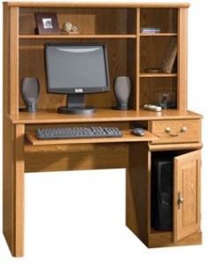 Spotless workspace. This computer desk is a master of organization. In Carolina oak finish. Product Features: Slide-out shelf keeps keyboard and mouse at your fingertips. Metal runners and safety stops offer easy opening. Hutch with adjustable shelves provides storage for supplies. Convenient CPU storage keeps your desk organized. Carolina oak finish adds charm to any room. Product Details: 56 1/4H x 42 1/2W x 19 1/2D Engineered wood Assembly required Manufacturer's 5-year limited warranty Model no. 401353 Promotional offers available online at Kohls.com may vary from those offered in Kohl's stores. Gender: Unisex. Age Group: Adult. Material: Wood/Oak.