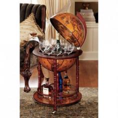 This Italian-style Old World globe is an antique-inspired standing globe that features a portable wine rack with caster wheels for easy movement and sturdy wood construction. Convenient and stylish, the top lid of globe opens so you can put your favorite beverage or bottle inside. This globe is a perfect decor accent piece for your home or office and it will look superb in any formal setting while being functional with style and grace. Italian-style Old World globe portable wine rack Caster wheels for easy movement Top lid of globe opens Materials: Wood Dimensions: 37 inches high x 22 inches in diameter
