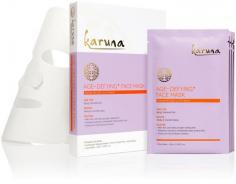 Karuna brings compassion to your skin. The mask and serum duo offers so much more than a serum, clay or gel does on its own. The Karuna Anti-Aging Mask contains Wild Yam to help increase collagen renewal and Elderberry Extracts to improve elasticity levels. Revive and bring vitality back to your skin with this no-rinse mask. Benefits: Hyaluronic Acid helps to infuse moisture. Leaves skin hydrated, softer and smoother. Diminishes the appearance of lines and wrinkles. Formula is 100% all natural fiber cloth, paraben free and dye free.