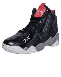 Made famous by the Reign Man, Shawn Kemp, the Kamikaze II is now available in a kid-sized mid-cut that matches comfort and style, point for point. Plus, this already infamous icon includes a bold pops of pink for an added dash of girls-only style. Size: 5.5. Color: Black / Solid Grey / Flat Grey / Red Rush. Gender: Unisex. Age Group: Kids.