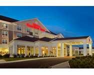 Welcome to the Hilton Garden Inn Auburn hotel in New York! You'll find us conveniently located in downtown Auburn, within walking distance of the Auburn Public Theater and just a short drive to the picturesque Finger Lakes Region of New York State. The Hilton Garden Inn is your ideal hotel choice when visiting Auburn and Skaneateles. Just 40 minutes west of Syracuse and 75 minutes east of Rochester, the Hilton Garden Inn of Auburn is a perfect central location between the two cities. The Hilton Garden Inn is also your first choice for wedding receptions, meetings and events for up to 300. Activities abound for our hotel guests in the Finger Lakes Region, including the Auburn Public Theater which is within walking distance, and only minutes from terrific shopping at Bass Pro Shops, as well as the Waterloo Premium Outlets. Merry-Go-Round Playhouse and the popular Cayuga Lake Wine Trail are a short drive from the Hilton Garden Inn. The Hilton Garden Inn of Auburn NY is the perfect hotel choice whether you are traveling for business or pleasure in the Finger Lakes Region of Central New York. The closest airport to the Hilton Garden Inn Auburn is the Syracuse Hancock International Airport (SYR) Dining at the Hilton Garden Inn is a pleasure. The Great American Grill restaurant, located in the hotel lobby, features a bountiful breakfast buffet every day to help kick off a successful business day or fun activity that central New York and the Finger Lakes region offers. The imaginative, elegant and attentive style of Beau Vine Restaurant and Wine Bar welcomes our guests daily for lunch and dinner. A contemporary chop house with a bistro ambiance, you'll savor wines from around the world as well as the Finger Lakes wine region. Accompany your wine selection with a hearty steak, locally sourced produce and succulent seafood. Outdoor dining in our Garden Courtyard or the intimate setting overlooking the Garden is the perfect way to enhance your dining experience. Guests of the Hilton Garden Inn Auburn in New York have full use of many amenities including * Evening room service and on-site catering * 24-hour Pavilion Pantry convenience mart * Complimentary 24-hour business center * Wireless internet service throughout the hotel * Indoor heated swimming pool * Complimentary fitness center with equipment by Precor * Complimentary outdoor parking * Valet and coin operated self-laundry * Complimentary cookies every evening from 5 - 9 pm welcoming you each nigh Our guest rooms are tastefully appointed and offer many of the standard hotel amenities along with the following * Complimentary high-speed & wireless internet access * Complimentary, secure printing to the 24-hour business center * Refrigerator, microwave oven and coffee maker The Hilton Garden Inn of Auburn looks forward to welcoming your social or business event. Leave the details to us.