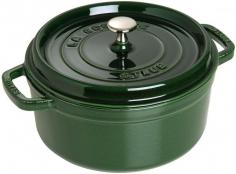 Dutch Ovens - A unique self-basting system and generous capacity make the 13-Qt. Staub Round Cocotte versatile for cooking juicy gourmet entrees and one-pot dishes. Handcrafted in France, the Staub cookware prepares roast beef, pork, poultry, vegetables and more to succulent, flavorful perfection. With its superb heat distribution and retention, the enameled cast-iron Dutch oven hides its secret under the lid. Rounded spikes collect and release condensation to shower juices continuously over food. The circulation of heat with juices allows ingredient flavors to maintain full intensity, while preserving nutrients. A Staub signature black matte enamel interior is superior for high-heat searing, plus braising and caramelizing. The more you cook with the cast-iron cocotte, the better it performs, seasoning naturally with use, without maintenance. Cast in a single-use mold, the Staub cookware is high-fired at 1,400 F, with 2-3 separate coats of enamel inside and out and is PTFE- and PFOA-free. Resistant t - Specifications Made in France Material: enameled cast-iron, stainless-steel/nickel Model: 1103485 (basil), 1103425 (black), 1103406 (cherry), 110391 (dark blue), 1103418 (graphite), 1103487 (grenadine) Capacity: 13 1/4 qt. / 12.5 L Size: 13 1/3" Dia. (17"W with handles) x 6 1/2"H (8 3/4" with lid) Base: 11 1/2" Dia. Weight: 21 lb. 12 oz. Use and Care Before first use, wash with warm water and dishwashing liquid, then dry. Apply a small amount of cooking oil in your pot before using to enhance the properties of the special black enamel. Dishwasher-safe, but hand washing recommended. Oven-safe to 500 F and broiler-safe. Suitable for gas, electric, glass, halogen and induction stove tops.