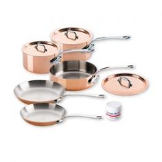 Featuring impeccable construction, these heirloom-quality copper pans are painstakingly crafted by hand in France. This set contains five essential pans and makes a great premium gift for your favorite chef or an amazing upgrade to a gourmet kitchen. Perfect for a wide range of cooking tasks, these pans are praised by chefs around the world for their versatility and efficient heat transfer. Manufacturer: MauvielIncludes: 1.9-qt. saucepan with lid; 3.6-qt. saucepan with lid; 3.2-qt. saute pan with lid; 10.2" skillet; 8.6" skillet Material: Copper; stainless steel Care: Hand wash only (see special-care instructions below)Dimensions: 8.6" x 1.3"; 10.2" x 1.88"; 6.3" x 3&frac12;"; 8" x 4.3"; 9&frac12;" x 2&frac34;"Capacity: 1.9 qt.; 3.6 qt.; 3.2 qt. Warranty: LifetimeMade in FranceFEATURESCombines two powerful cooking materials: 1.5mm copper and 18/10 stainless steel Copper exterior provides exceptional heat conductivity and control; stainless-steel interior is non-reactive Tight-fitting lids seal in moisture and keep food warm until ready to serve Ergonomic stainless-steel handle remains cool to the touch and is securely riveted for a lifetime of use Suitable for use with most stovetop heat sources; not suitable for use with induction cooktops; oven and broiler safe to 500 FAlways cook on low to medium heat; do not overheat empty pan; when cooking on a gas stovetop, ensure that the flame never extends beyond the base of the pan Special-Care Instructions: Copper is an exceptional material for kitchen use. Maintained properly, your copper cookware will last for generations. Before first use and after each use, carefully wash with hot, soapy water then rinse and dry. Over time, copper can change color through use; however, this change is cosmetic and does not change the conductivity of the material. Never clean with bleach or scrub with steel wool, as this can lead to irreparable damage. If food sticks to the inside, soak in hot, soapy water. To restore the shine to your Mauviel pots and pans, use Mauviel Copperbrill Copper Polish.