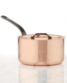 This Mauviel M'heritage 1.9 quart copper sauce pan with lid and cast iron handle is an amazing small to medium-sized pan for making any type of sauce. The stainless steel cooking surface won't react with food or affect its taste so you can use it to prepare tomato sauce or other acidic foods. This sauce pan from Mauviel also has a polished copper exterior that looks great with its cast iron handle. Mauviel cookware comes with a lifetime guarantee with normal use and proper care. Mauviel cookware has been produced in France since 1830.