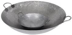 This 16" Steel Hand Hammered Cantonese Wok from Town Food Equipment is a great piece of equipment to add to your kitchen especially if you are looking to stir-fry. Also used to steam deep-fry stew and making soups a wok is a versatile piece that can help you achieve great results with your dishes. This particular wok is constructed from hand-hammered cold-forged steel making it extremely durable. With riveted handles this wok is easy to handle while cooking. Perfect for Mandarin cooking this wok is a sturdy and versatile piece to work with. Base Material: Metal. Cookware Type: Wok. Diameter: 16". Handle Type: Loop. Height: 4.75". Metal Thickness: 19 Gauge. Metal Type: Steel. Wok Bottom Type: Round Bottom.