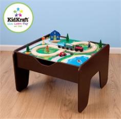 Double-sided play board Includes 200 LEGO-compatible blocks and 30-piece train set Convenient storage under the play board Large enough that multiple children can play at once Sturdy wood construction with espresso cabinet finish Dimensions: 25L x 23W x 17H inches Recommended for ages 3 and up. Elevate playtime with the KidKraft 2-in-1 Espresso Table with LEGO-Compatible Board. This sturdy wood table is topped by a two-sided brightly colored surface where the busy young engineers in your life can build towering structures on a level surface. Combined with ample storage under the play board this raised table keeps toys tidy contained and off the floor. Large enough to play with friends this versatile table comes with 200 blocks and a 30-piece train set for hours of inventive fun. Espresso finish. About KidKraftKidKraft is a leading creator manufacturer and distributor of children's furniture toy gift and room accessory items. KidKraft's headquarters in Dallas Tex. serves as the nerve center for the company's design operations and distribution networks. With the company mission emphasizing quality design dependability and competitive pricing KidKraft has consistently experienced double-digit growth. It's a name parents can trust for high-quality safe innovative children's toys and furniture. Create your own LEGO city or set up a figure-eight train set on this 2-in-1 table from KidKraft that comes with 200 blocks and a 30-piece train set. The surface flips over to give you multiple options for play and storage underneath provides room for train cars blocks and accessories to safely spend the night. You can rely on the sturdy wood construction to hold up to many hours of vigorous play and the table is large enough to accommodate your child and all of his or her friends.