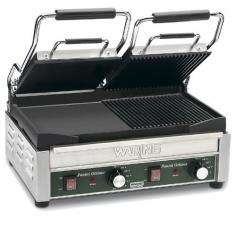 Warings Dual Surface Panini Grill WDG300 is an electric grill with ribbed plates on one half and flat cast iron plates on the other to produce sandwiches of warm, melty goodness with beautifully browned bread. The WDG300 Sandwich Grill has a 17 x 9-1/4 cooking surface. The top plates are hinged and lifted up and down with heat-resistant handles. The Dual Surface Panini Grill accommodates foods up to three inches thick thanks to the auto-balancing upper plate, so you can grill up sandwiches stuffed with fillings. This Panini Grill is designed to handle heavy commercial use and features a durable brushed stainless steel body and removable drip tray for easy clean up.