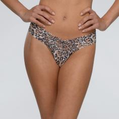 Flirty and feisty. Soft signature lace thong flaunts a lush leopard print. Low rise sits below the hips. Wide stretch waistband boasts a sexy V-shape. Scalloped edges enhance the waistband. Solid trim styles the front and back panel. Lays flat on the body for a smooth look under clothes. Absolutely no VPL! Cotton gusset. As a result of the stretch waist, one size fits 2-12.100% nylon; Trim: 90% nylon, 10% spandex; Lining: 100% cotton. Hand wash cold, dry flat. Made in the U.S.A.If you're not fully satisfied with your purchase, you are welcome to return any unworn and unwashed items with tags intact and original packaging included.