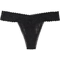 This Maidenform thong is lacy and luxurious. A sexy V silhouette combines with a wide waistband and stretchable flexibility for ultimate comfort and flirty everyday wear. One size fits most Color options: Black, black dot print, black/ik, body beige, tenacious teal stripe, white Print: Solid, print Closure: Pull-on Measurement Guide Click here to view our women's sizing guide Body materials: 83-percent nylon, 17-percent elastane Lace waistband: 87-percent nylon, 10-percent elastane, 3-percent polyester Crotch Lining: 100-percent cotton Care instructions: Hand wash Model: 40118 We cannot accept returns on this product. All measurements are approximate and may vary by size.
