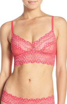 b.tempt'd by Wacoal Lace Kiss Bralette Bra (910182). This soft wireless bralette bra is made of an all-over floral, stretch lace. It's the perfect bra for sleep or anytime you want light support. Unlined, wireless cups shape and support the breasts without uncomfortable underwires or bulky padding. Elastic underband provides additional support for the bust. Elastic along top of back for custom fit and comfort. Elastic shoulder straps adjust with metal hardware in back. See matching b.tempt'd by Wacoal Lace Kiss Bikini Panty 978182 and b.tempt'd by Wacoal Lace Kiss Thong 970182. Please Note: Model is wearing nipple covers for modesty.