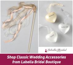 Shop the classic wedding accessories from Labella Bridal Boutique for your big day. We offer wide assortment of accessories includes flower baskets, handbags, jewelry, jackets and shawls that are compliment your gown. 