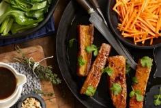 Ginger-braised pork belly with pak choy & pickled carrots