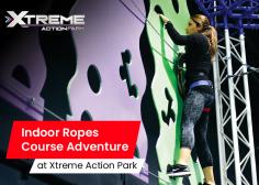 High Indoor Ropes Course Adventure with Advanced and Beginner Levels where climbers can cross several unique obstacles directly over our Arcade Game room.