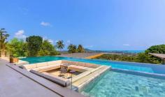 6 Bedroom Hillside Villa with Infinity Pool in Koh Samui, Comfortably sleeps up to 15 guests with 2 swimming pools, spacious grounds, designer interiors and panoramic ocean views.