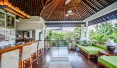 Designed as a holiday home for the owners themselves, this 4-bedroom villa has an wonderfully central location in Seminyak. Book with Villa Getaways.