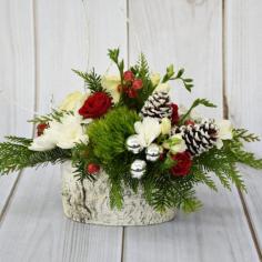 TIS THE SEASON OF GENEROSITY & APPRECIATION- SHOW THAT SPECIAL SOMEONE WITH THIS BIRCH BOWL ARRANGEMENT OF WHITE AND RED ROSES, HYPERICUM BERRIES AND CHRISTMAS GREENS

