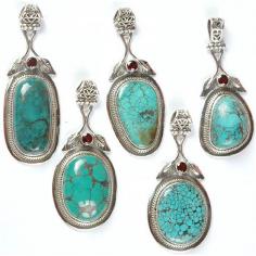 Buy Lot of Five Spider's Web Turquoise Pendants with Garnet and Sterling Leaves

A jewel when accurately matched with any attire gives out its best results in highlighting the personality of the individual. We present to you a set of five pendants in distinctive shapes of an intense sky blue hue in a Turquoise gemstone having speckled markings of varied designs of spider’s web all over the surface.